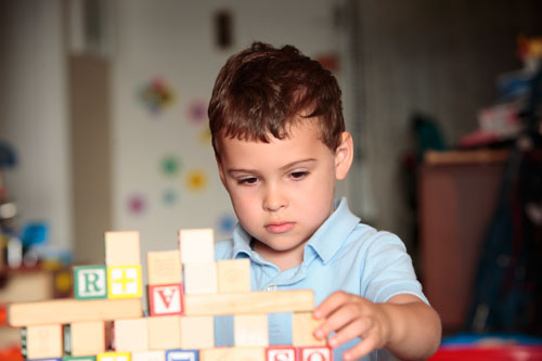 Child Playing with Blocks
