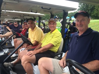 Golfers in Golf Carts