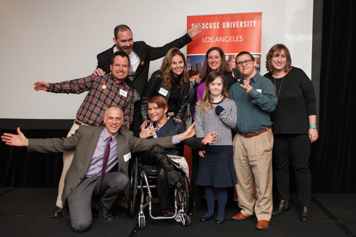 The “Redefining Inclusion” panelists and guests pose for a group photo before the LA event. Dan Habib kneels next to Andy Arias, with (from left) Micah Fialka-Feldman, Brent Elder, Amy Brenneman, Beth Myers, Megan and Sean from A&E's Born This Way, and Carrie Rosen. Photo by Rich Prugh