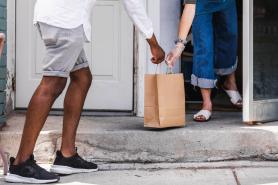 A contactless delivery dropoff on someone's doorway stoop