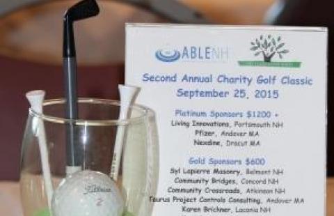 Second Annual Charity Golf Classic - picture of figurine and sponsor card