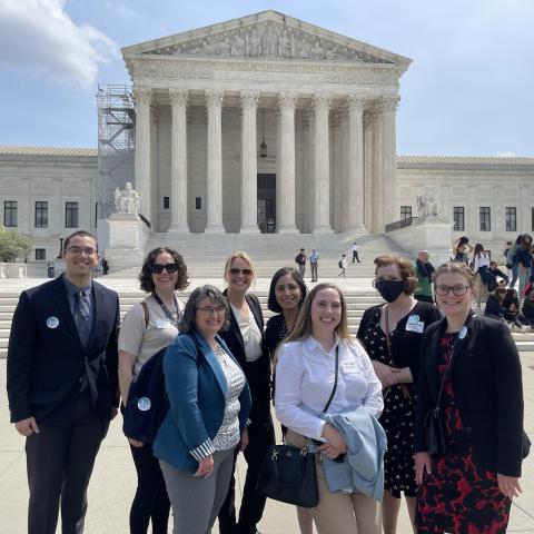 A group of LEND Trainees poses in front of the Supreme Court building of the United States