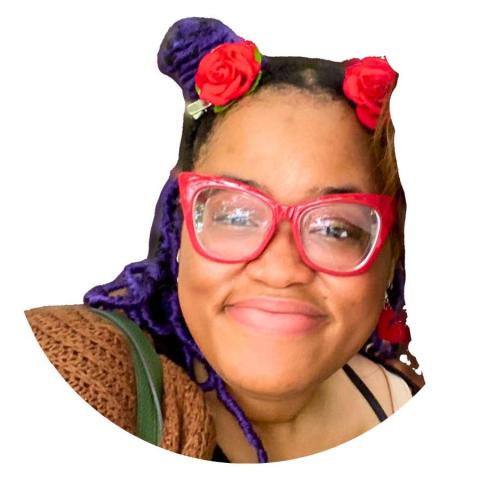 Briana Thompson is a woman with glasses